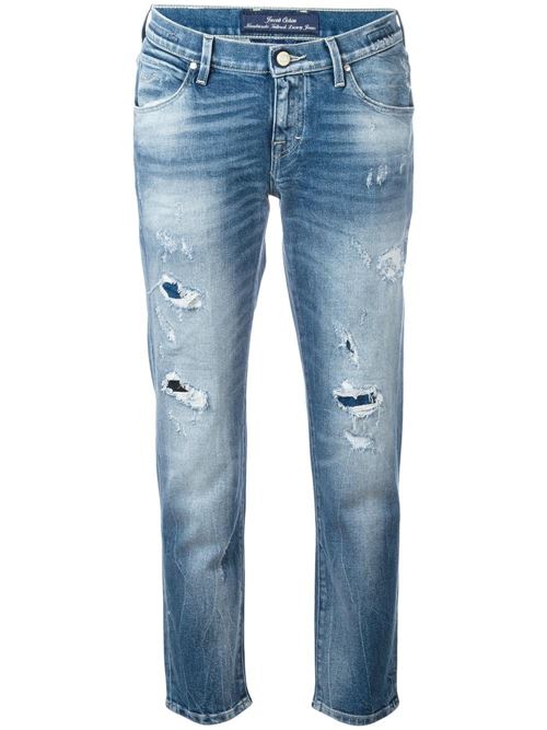 протертые рваные джинсы