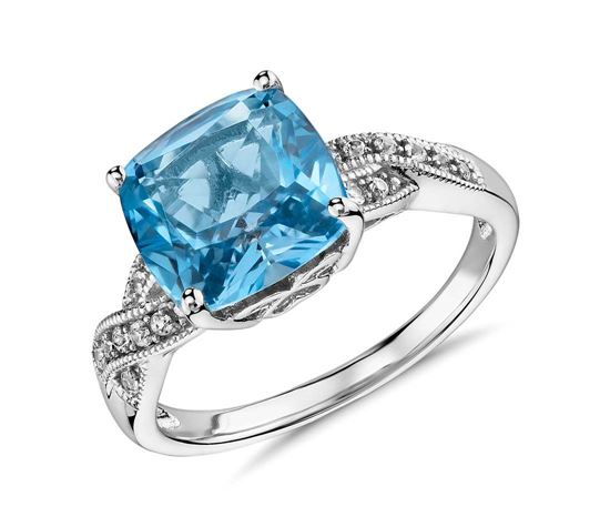 помолвочное кольцо из серебра с голубым топазом и бриллиантами