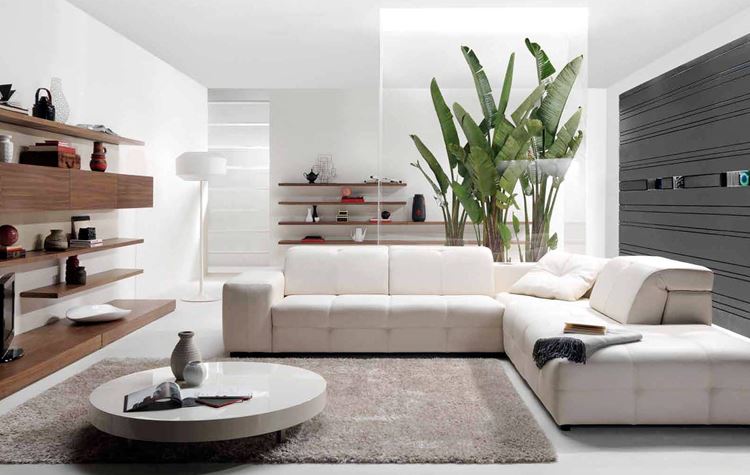 Белый диван в интерьере: бело-серая квартира-студия с большим кожаным угловым диваном
