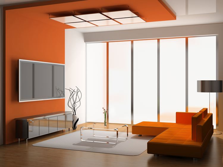 Оранжевый диван в интерьере: гостиная в ярких оранжевых тонах с диваном в стиле конструктивизм